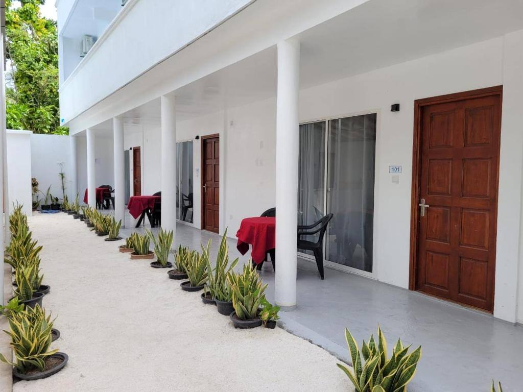 Guest room corridor and terraces at Dhonkamana Stay